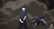 a man is standing next to a flying object in a video that says tiktok