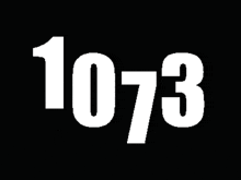 a black background with white numbers 1073