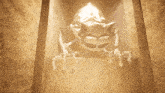 a statue of a monster with horns is hanging from a pillar