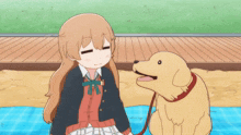 a girl and a dog are laying on a blue blanket