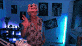 a person wearing a crown that says sex girl on it