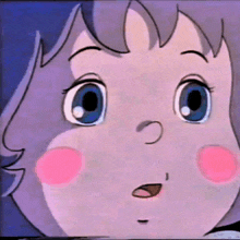 a close up of a child 's face with a pink cheek
