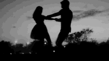 Falling In Love  GIF - Silhouette Couple Spin GIFs
