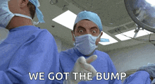 a surgeon in an operating room with the words we got the bump on the bottom