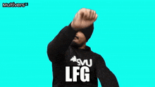 a man wearing a black sweatshirt with the word lfg on the front