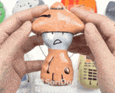 a person is holding a toy that says soridori and thesoridori on it