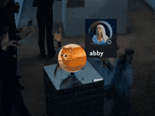 a picture of a doge and a picture of a woman with the name abby on it