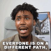 a man is making a funny face with the words everyone is on a different path