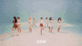 a group of women are dancing in front of a studio choom sign