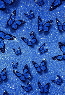 a bunch of blue butterflies flying on a blue glitter background .