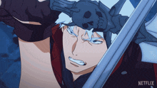 a man with a skull on his head is holding a sword with netflix written on the bottom