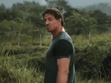 Looking Behind Barney Ross GIF - Looking Behind Barney Ross Sylvester Stallone GIFs