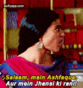 a woman in a pink and blue dress is talking to another woman in a shop .