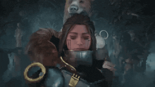 a woman with a bear on her head looks down