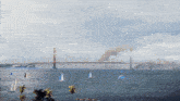 a bridge over a body of water with boats in the water