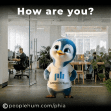 a penguin mascot wearing a peoplehum shirt