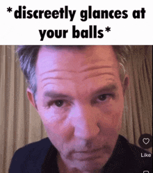 a picture of a man with the words discreetly glances at your balls on it