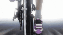 a close up of a person riding a bike