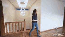 a video of a woman walking down stairs made in animatica