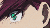a close up of a person 's face with a cat 's eye