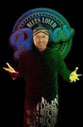 a man stands in front of a sign that says " blues lover "