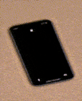 a cell phone with a bloody picture of a woman on the screen
