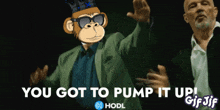 a man in a suit and a monkey with a crown on his head says you got to pump it up gif jif