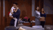 Griffin Munro Tuck In To Bed GIF - Griffin Munro Tuck In To Bed General Hospital GIFs