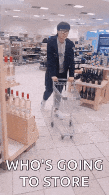 a man pushing a shopping cart in a store with the words who 's going to store