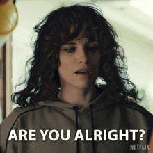 a woman with curly hair is asking are you alright from netflix
