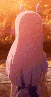 a girl with long white hair and ears is standing in a park .
