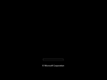 a black background with a green loading bar and the microsoft corporation logo