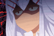 a close up of a girl 's face with a shadow on her face