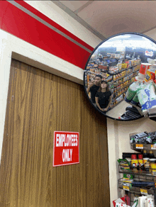 a store with a sign that says employees only on it