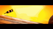 a bottle of super glue is being used to fix a piece of wood