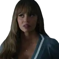 a woman with long hair and bangs is wearing a gray sweater