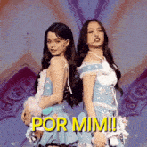 a couple of women standing next to each other with the words por mimi written on the bottom