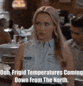 a woman in a blue shirt with the words frigid temperatures coming down from the north on the bottom