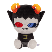 a stuffed toy with horns and a shirt that says ii on it