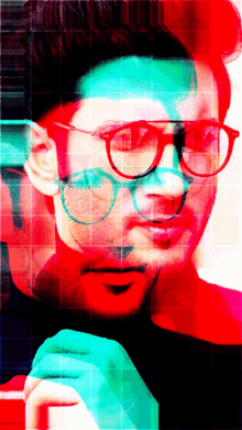 a man wearing glasses and a black shirt is surrounded by red and green squares