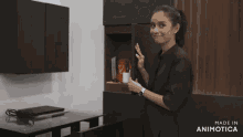 a woman opens a shelf with a bag of hard corn