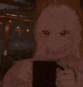 a girl wearing glasses and a sweater is holding a mug