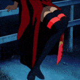 a woman in a red kimono with a blue belt with a star on it