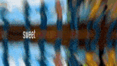 a blurred image with the word sweet on the bottom