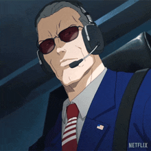 a man in a suit and tie with headphones and a netflix logo in the corner