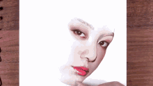 a drawing of a woman 's face with a pencil