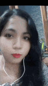 a close up of a woman wearing headphones