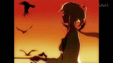 a silhouette of a girl with birds flying in the background
