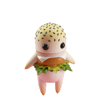 a toy that looks like a hamburger with sesame seeds on it
