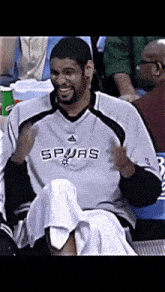 tim duncan laughing spurs san antonio spurs laughing on the bench